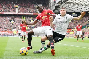 Eric Bailly (trái) vắng mặt trong đội hình Man.United đầy bí ẩn. Ảnh: Getty Images 