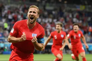 Harry Kane ăn mừng sau cú đúp vào lưới Tunisia. Ảnh: Getty Images