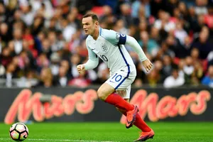 Wayne Rooney khi còn mang băng đội trưởng tuyển Anh. Ảnh: Getty Images 