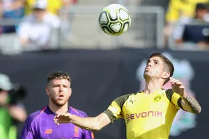 Christian Pulisic (phải) tỏa sáng càng thôi thúc nỗ lực của HLV Jurgen Klopp. Ảnh: Getty Images