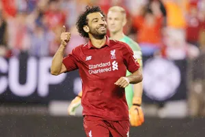 Mohamed Salah mừng bàn thắng trong ngày đầu trở lại đội hình Liverpool. Ảnh: Reuters
