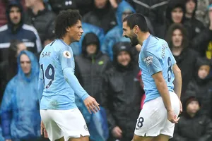 Ilkay Gundogan (phải) mừng bàn thắng góp công vào kết quả ấn tượng tại Cardiff City. Ảnh: Getty Images 
