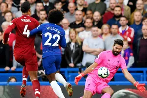 Alisson đã hòa nhập nhanh để trở thành chỗ dựa cho Liverpool. Ảnh: Getty Images 