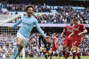 Leroy Sane ghi bàn quyết định trước nỗi thất vọng của hàng thủ Liverpool. Ảnh: Getty Images 