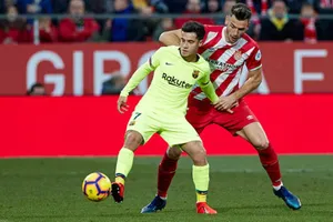 Philippe Coutinho (trái) đang trải qua quãng thời gian khó khăn ở Barca. Ảnh: Getty Images
