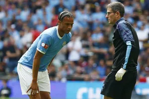 Leroy Sane (trái) nghỉ 7 tháng là mất mát lớn đối với Man.City. Ảnh: Getty Images 