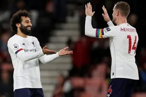 Những trụ cột như Jordan Henderson hay Mohamed Salah được duy trì thể trạng tốt đang giúp Liverpool. Ảnh: Getty Images