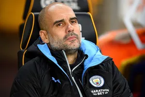 HLV Pep Guardiola thất vọng trên băng ghế chỉ đạo. Ảnh: Getty Images