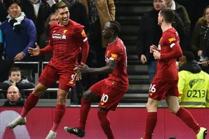 Roberto Firmino mừng bàn thắng đưa Liverpool đến gần thêm với chức vô địch. Ảnh: Getty Images