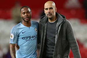 Hai nhân tố quan trọng HLV Pep Guardiola và Raheem Sterling được biết sẽ cam kết với Man.City. Ảnh: Getty Images