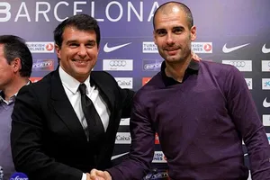 Joan Laporta sẵn sàng hợp tác với Pep Guardiola lần nữa nếu đắc cử Chủ tịch Barca. Ảnh: Getty Images