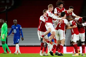 Niềm vui hiếm hoi và quý giá của các cầu thủ Arsenal. Ảnh: Getty Images
