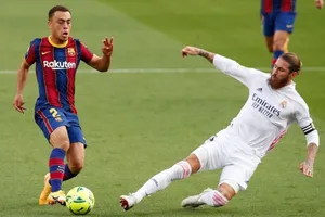 Sergio Ramos không thể chơi Siêu kinh điển vào cuối tuần tới. Ảnh: Getty Images 