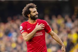 Mohamed Salah đã thay đổi ý định rời sân Anfield. Ảnh: Getty Images