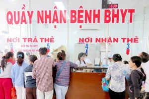 Bệnh nhân BHYT khám bệnh tại một cơ sở khám chữa bệnh. Ảnh: PHẠM THỌ