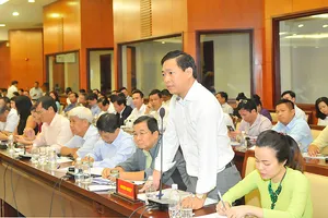 Doanh nghiệp đóng góp ý kiến tại buổi gặp gỡ với lãnh đạo TPHCM Ảnh: CAO THĂNG