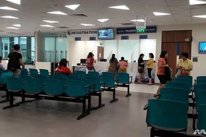 Bệnh nhân tại một phòng khám đa khoa thuộc hệ thống SingHealth ở Singapore. Ảnh: MEDIACORP