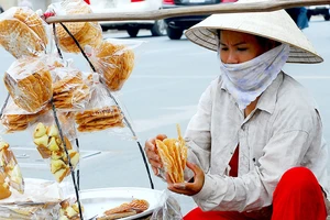 Quy mô người nghèo ở TPHCM không thay đổi nhiều, trong khi khoảng cách giàu nghèo gia tăng Ảnh: VIỆT DŨNG