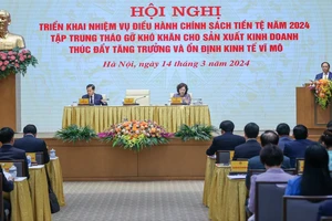 Thủ tướng chủ trì hội nghị về chính sách tiền tệ, tháo gỡ khó khăn cho sản xuất, kinh doanh. Ảnh: VIẾT CHUNG