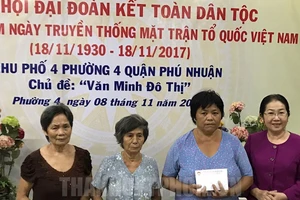 Tình làng nghĩa xóm củng cố khối đại đoàn kết toàn dân tộc