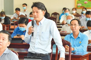 Một cuộc họp không giấy ở quận 7, TPHCM. Ảnh: VIỆT DŨNG