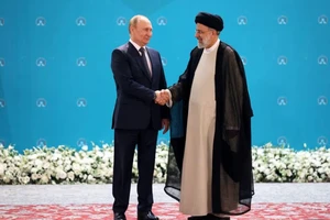 Tổng thống Nga Vladimir Putin (trái) và Tổng thống Iran Ebrahim Raisi tại một hội nghị tìm giải pháp cho xung đột ở Syria, diễn ra tại Iran năm 2022. Ảnh: REUTERS