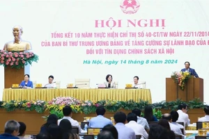 Thủ tướng Phạm Minh Chính dự Hội nghị tổng kết 10 năm thực hiện Chỉ thị số 40-CT/TW ngày 22-11-2014 của Ban Bí thư Trung ương Đảng khóa XI về tăng cường sự lãnh đạo của Đảng đối với tín dụng chính sách xã hội. Ảnh: VIẾT CHUNG 