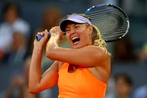 Maria Sharapova trong trận thua Eugenie Bouchard.