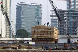 Châu Á tăng trưởng nhưng đề phòng nguy cơ thoái vốn