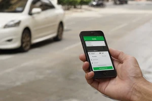 Uber nhượng lại hoạt động kinh doanh cho Grab