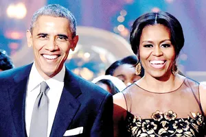 Vợ chồng ông Obama được người Mỹ ngưỡng mộ nhất năm