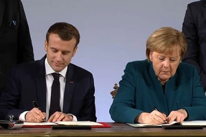 Thủ tướng Đức Merkel và Tổng thống Pháp Macron ký Hiệp ước Aachen. Nguồn: BFMTV.COM 