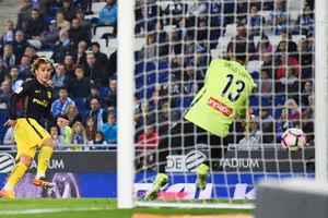 Griezmann và khoảnh khắc ghi bàn vào lưới thủ môn Diego Lopez.