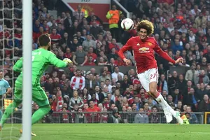 Marouane Fellaini ghi bàn mở tỷ số cho Man.Utd. Ảnh: Dailymail