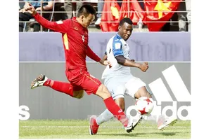 U20 Việt Nam (áo đỏ) trong trận đấu với U20 Honduras. Ảnh: TTX