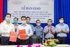 Quang cảnh công bố Phần mềm hệ thống thông tin địa lý GIS mã nguồn mở phục vụ quản lý dữ liệu công trình xây dựng. Ảnh: VIỆT DŨNG