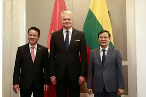 Tổng thống Litva đến dự diễn đàn doanh nghiệp Việt Nam - Litva. Ảnh: HÀ NGUYỄN