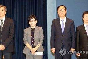 (From left) Cho Kuk, Cho Hyun-ock, Yoon Young-chan and Lee Joung-do stand before reporters at Cheong Wa Dae in Seoul on May 11, 2017. (Yonhap)