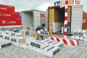 HCM City authorities seize containers of smuggled air conditioners and other electronic goods. — VNA/VNS