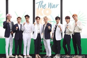 K-pop boy band EXO poses for the camera during a publicity event for its fourth album, "The War," at Grand Walkerhill hotel in Seoul on July 18, 2017. (Yonhap)