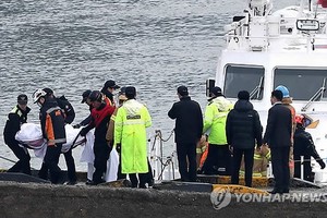 Rescue workers to resume search for two missing in capsizing of fishing boat