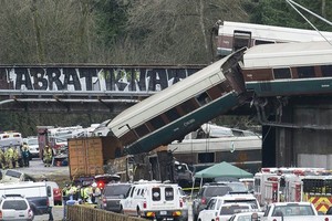 The scene of a portion of the Interstate I-5 highway after an Amtrak high speed train derailled from an overpass early Monday near the city of Tacoma, Washington state 