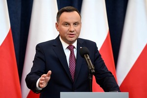 Poland’s President Andrzej Duda delivers a statement on Wednesday in Warsaw, where he announced that he signed into law two controversial judicial reforms that opposition politicians and the EU insist they undermine the rule of law and the separation of p