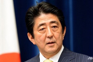 Abe rejects S. Korea's latest stance on sex slavery deal