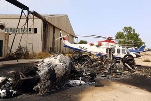 A planed destroyed during the attack. — AFP/VNA Photo