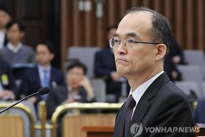 Prosecutor-General Moon Moo-il attends a parliamentary session of a special committee on prosecution reform at the National Assembly on March 13, 2018. (Yonhap)