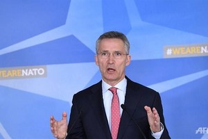 NATO Secretary-General Jens Stoltenberg addresses the press at NATO headquarters in Brussels on March 27, 2018. — AFP Photo