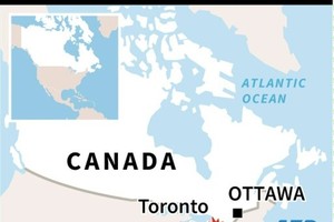 Van runs over Toronto pedestrians, up to 10 dead: police 