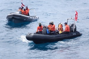 Search and rescue forces off the island (Source: VNA) 