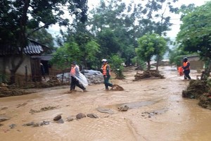28 dead & missing in flash floods after storm Son Tinh